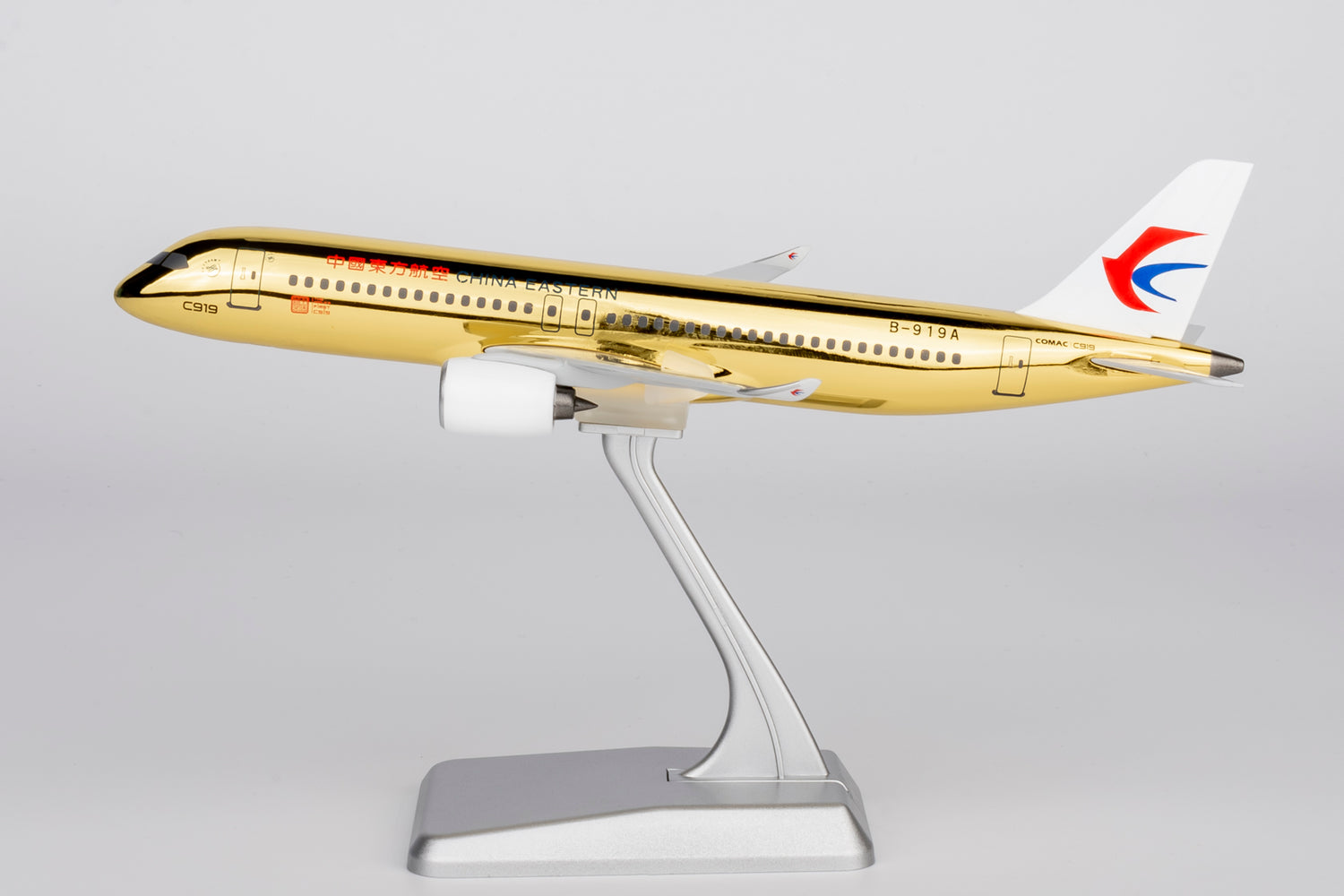 NG Models China Eastern Airlines (with Golden Fuselage; without Gears) COMAC C919 B-919A Lite Edition 1/240 Aircraft Scale Model
