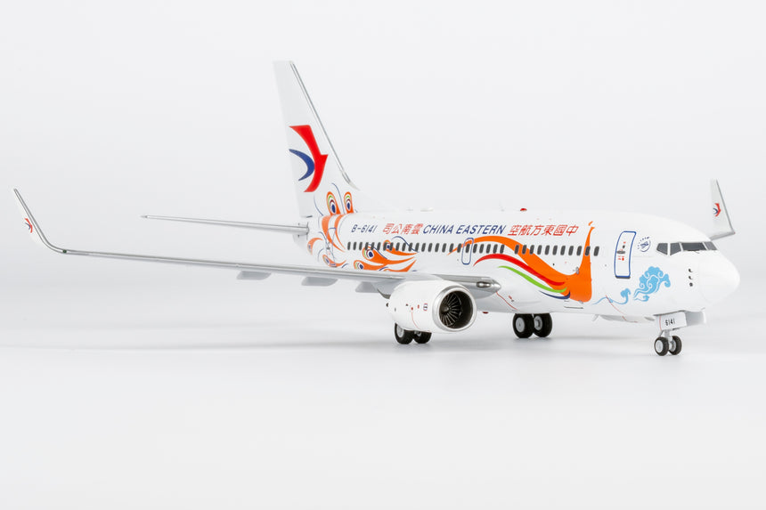NG Models China Eastern Airlines Yunnan Peacock (orange) Boeing 737-700/w B-6141 1/200 Scale