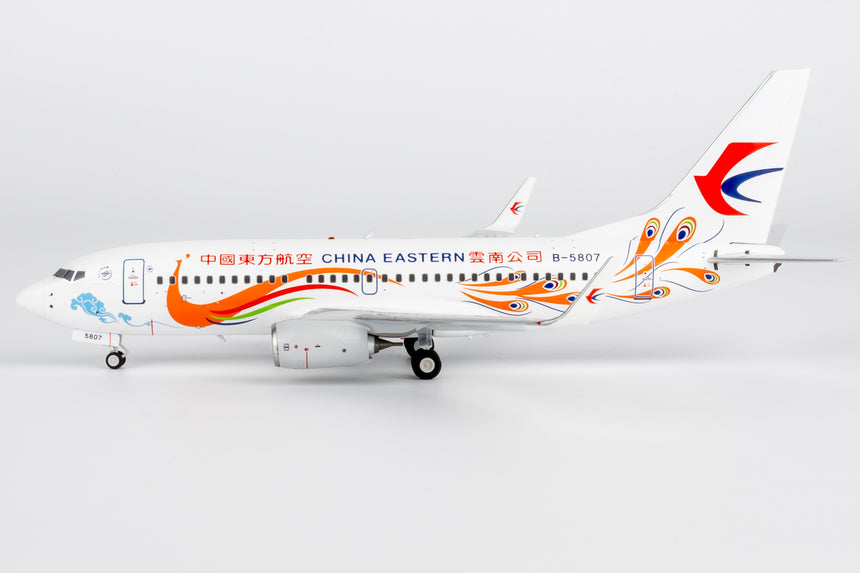 NG Models China Eastern Airlines Yunnan Peacock (orange) Boeing 737-700/w B-5807 1/200 Scale