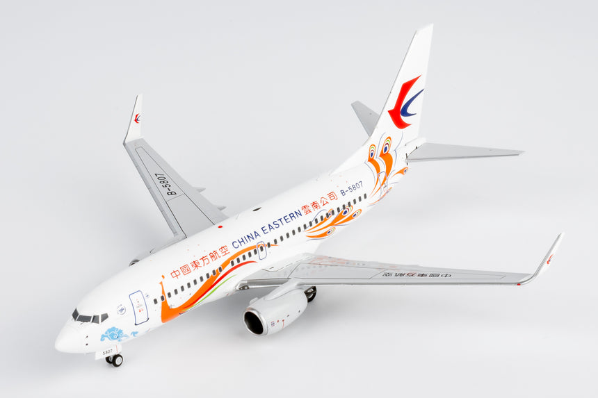 NG Models China Eastern Airlines Yunnan Peacock (orange) Boeing 737-700/w B-5807 1/200 Scale