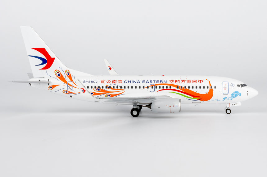 NG Models China Eastern Airlines Yunnan Peacock (orange) Boeing 737-700/w B-5807 1/200 Scale